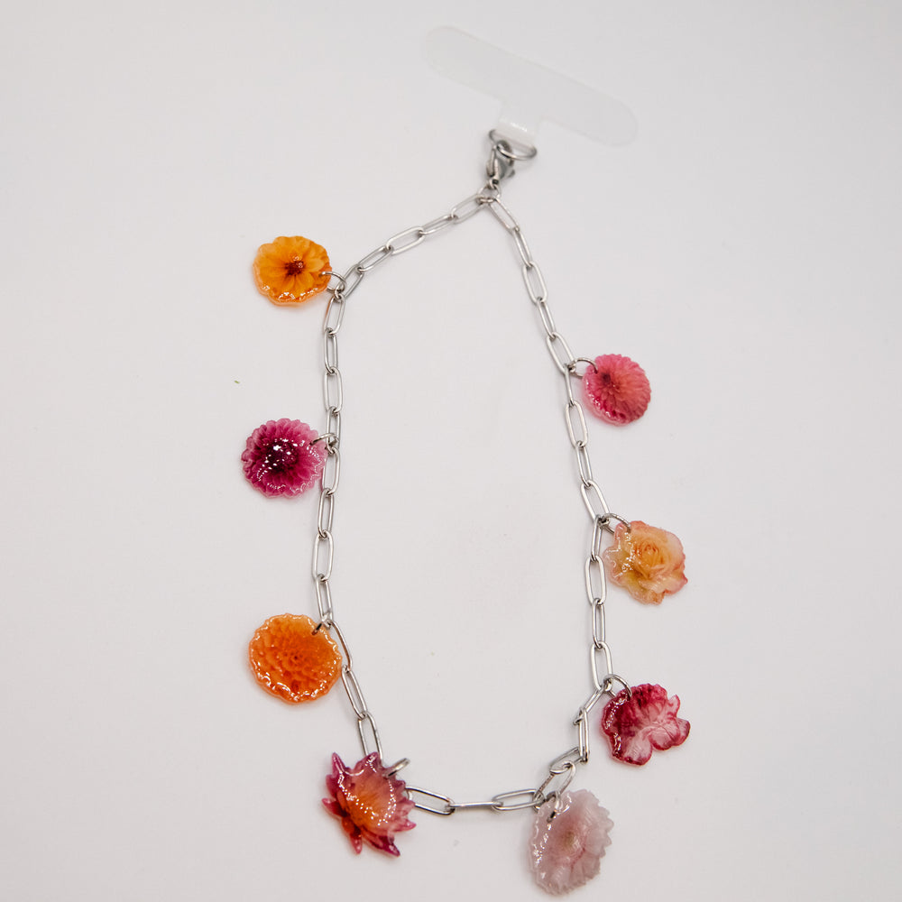 
                  
                    Garden Silver Phone Wristlet
                  
                