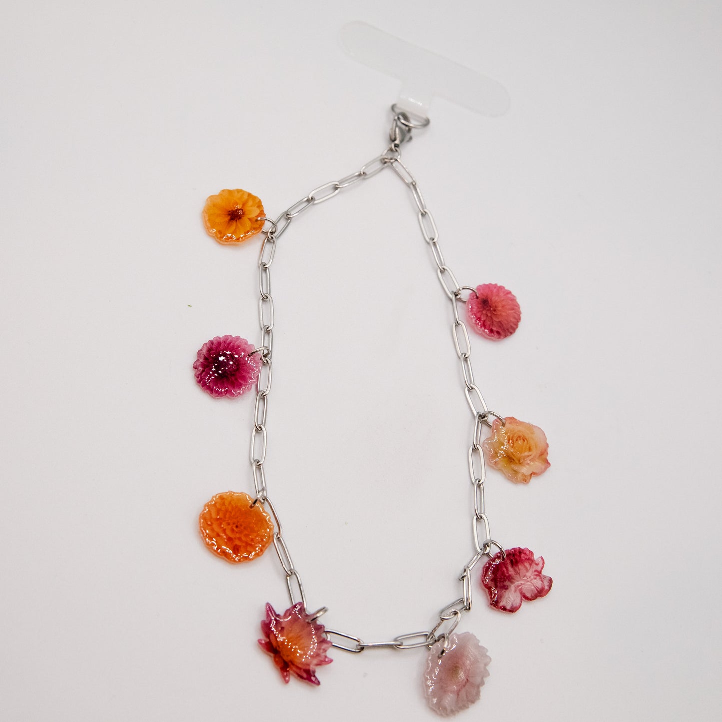 
                  
                    Garden Silver Phone Wristlet
                  
                
